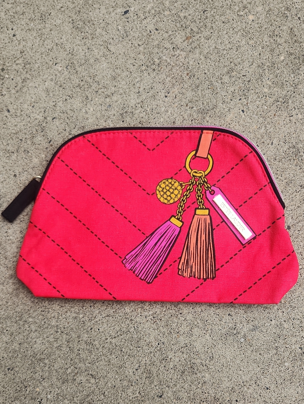 Red faux tassle cosmetic pouch